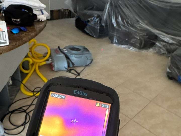 Thermal camera locating moisture in the floor